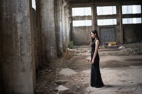 thoughtful girl in the abandoned building