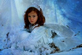 picture of the girl is wearing an angel costume