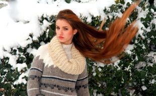 Girl with the long hair in the winter