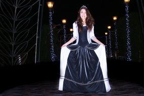 girl like a princess among christmas lights