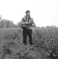 monochrome picture of a photographer on the field