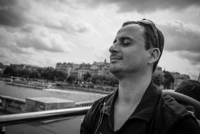 Black and white portrait of the man and tourism in Paris
