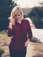 portrait of a woman in plaid shirt