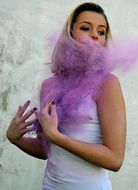 blonde with a purple shawl at a photo shoot