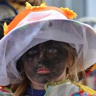 Carnival Costume face in soot and hat