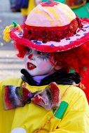 the child is dressed as a clown