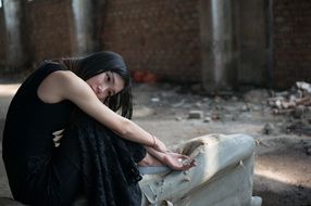 asian model posing among ruins