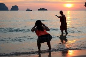 woman posing on a sunset background