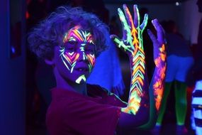 Boy with neon colours on a body