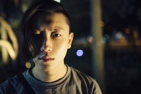 portrait of a young man at dusk
