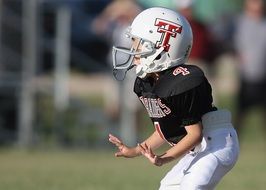 player in a suit on the field
