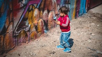 boy with spray