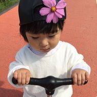 Asian girl with a flower on a head