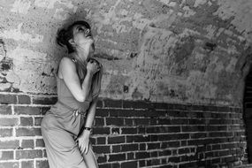 Black and white photo of the girl in the tunnel