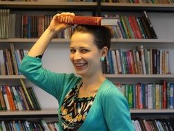 Girl with the book in the library