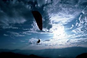 paragliding in the evening sky