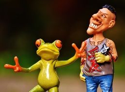 toy frog and tattoo artist