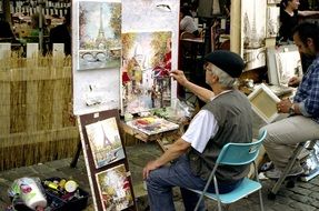 street artists on montmartre in paris