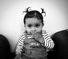 black and white portrait of a charming child