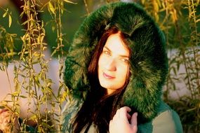 girl in a hood with green fur