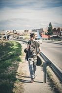 Boy walking on road