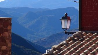 Picturesque landscape of the roof and mountains