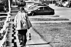 black and white photo of a homeless man