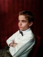 serious child Boy in white shirt, portrait
