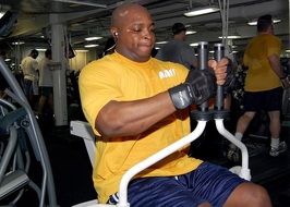 man on a cardiovascular exercise machine