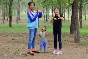 three funny kids in the park