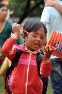 Vietnamese child on a street party