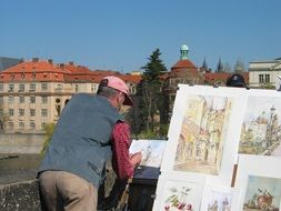 artist paints a city in the Czech Republic