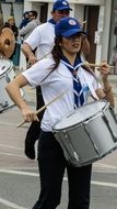 girl with a drum at the parade on independence day in greece