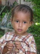 poor girl in Sulawesi, Indonesia