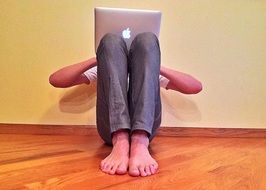 young man with MacBook