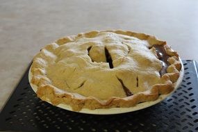 traditional apple pie on a plate