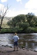 fisherman on a creek in south africa