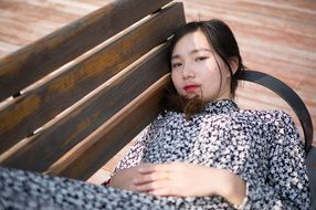 asian model on the bench
