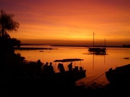 orange sunset over a lake in bolivia