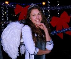smiling girl like princess at christmas