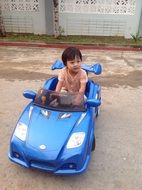 baby in baby blue car