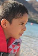Kid on a river