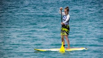 picture of the girl is Paddling