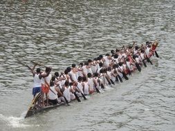 group of tourists boating in asia