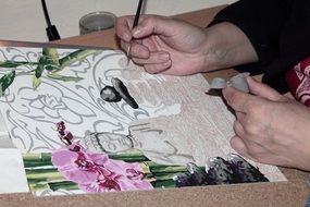 painter with brush in process