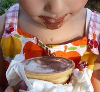 girl got dirty with chocolate ice cream