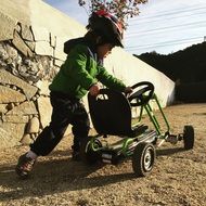 Young small child goes kart