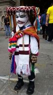 man in carnival costume at the parade in Peru