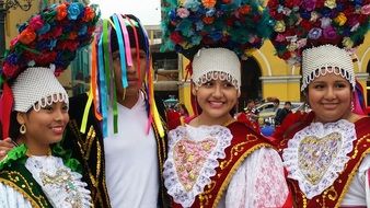 people in carnival costumes at a parade in Peru