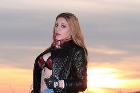 seductive woman in leather jacket